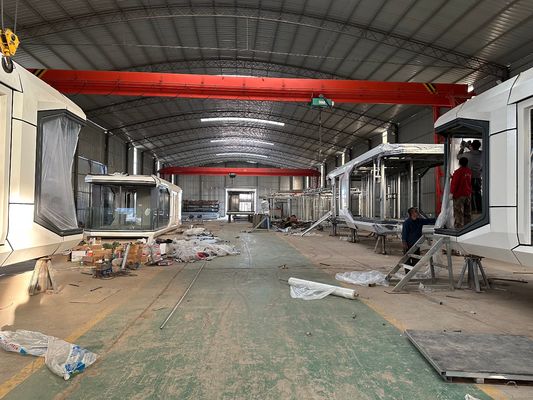 Fenêtre en aluminium à faible émission de carbone Économie d'énergie Maison modulaire Villa habitation Maison capsule Hôtel Cabine préfabriquée avec meubles